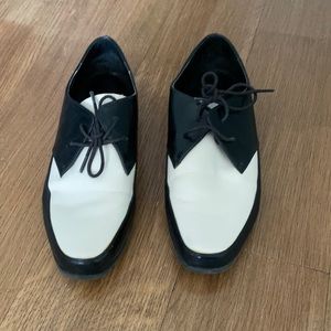 Black and white Oxford shoes